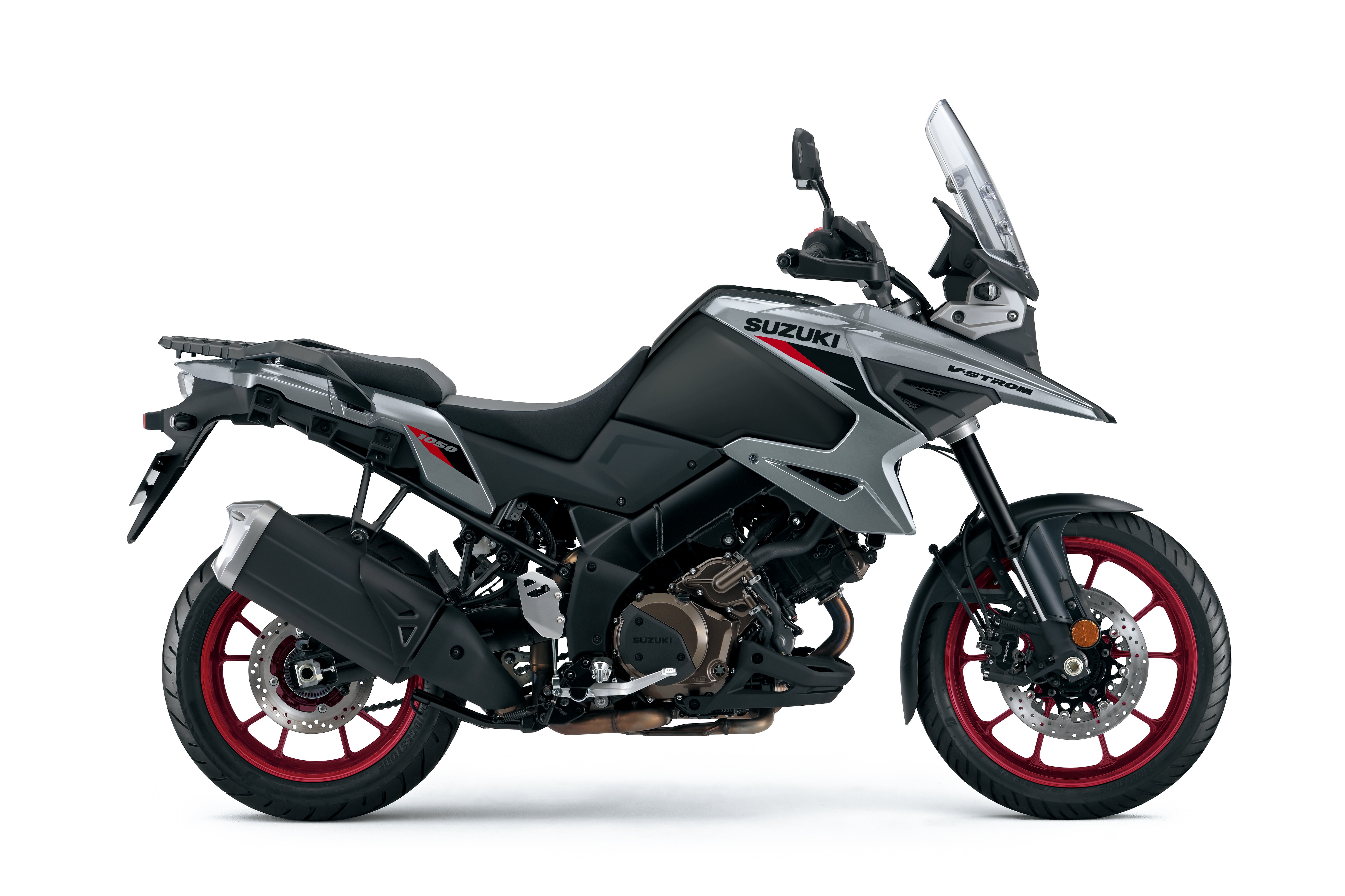 The profile view of the 2026 Suzuki V-Strom 1050 in the new Metallic Matt Steel Green colour.